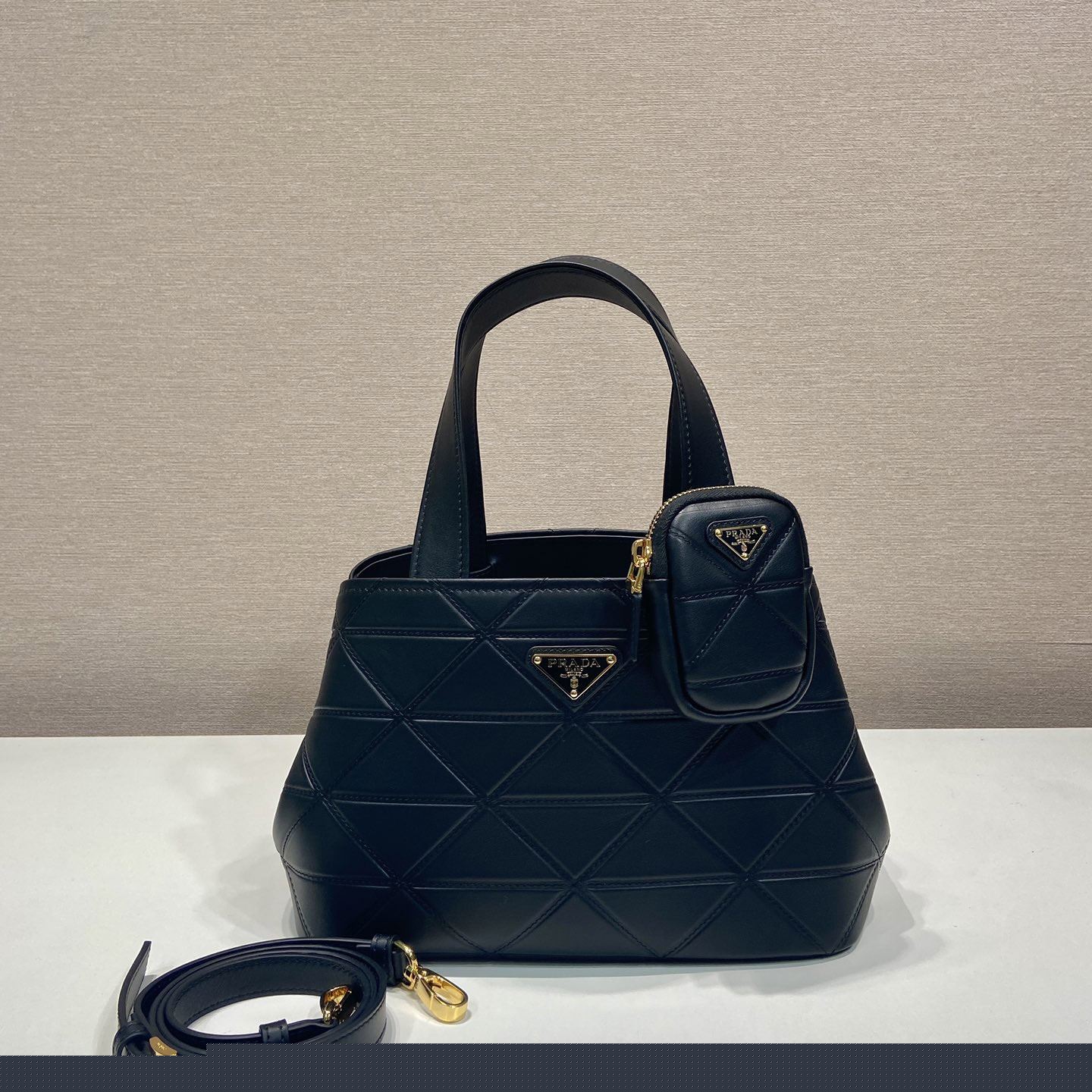 Pra*a top handle bags